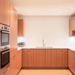 Explore уреди за вграждане in a sleek kitchen design showcasing modern built-in appliances.